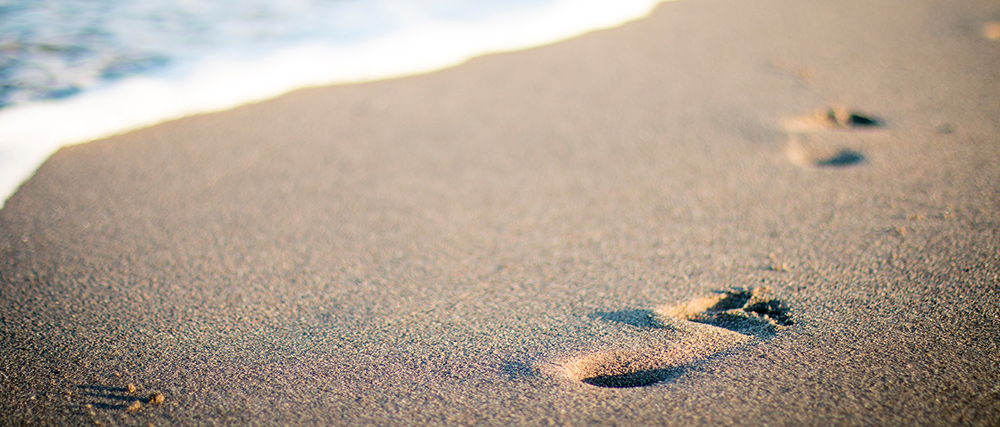Titelbild: Spuren im Sand